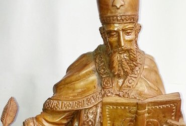 Aurelio Rodríguez - San Agustin escribiendo. | Dimensiones: 67 cms alto. | Tipo de madera: Nogal. | Precio: $1.300.000.-